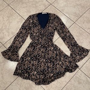 Saints + Secrets floral wrap around dress